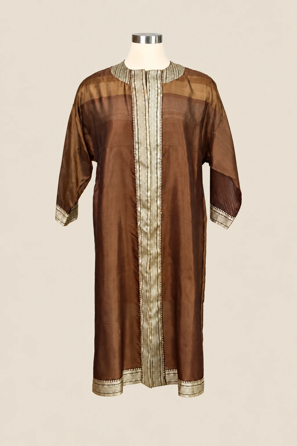 Bronze Amara on a cream dress form